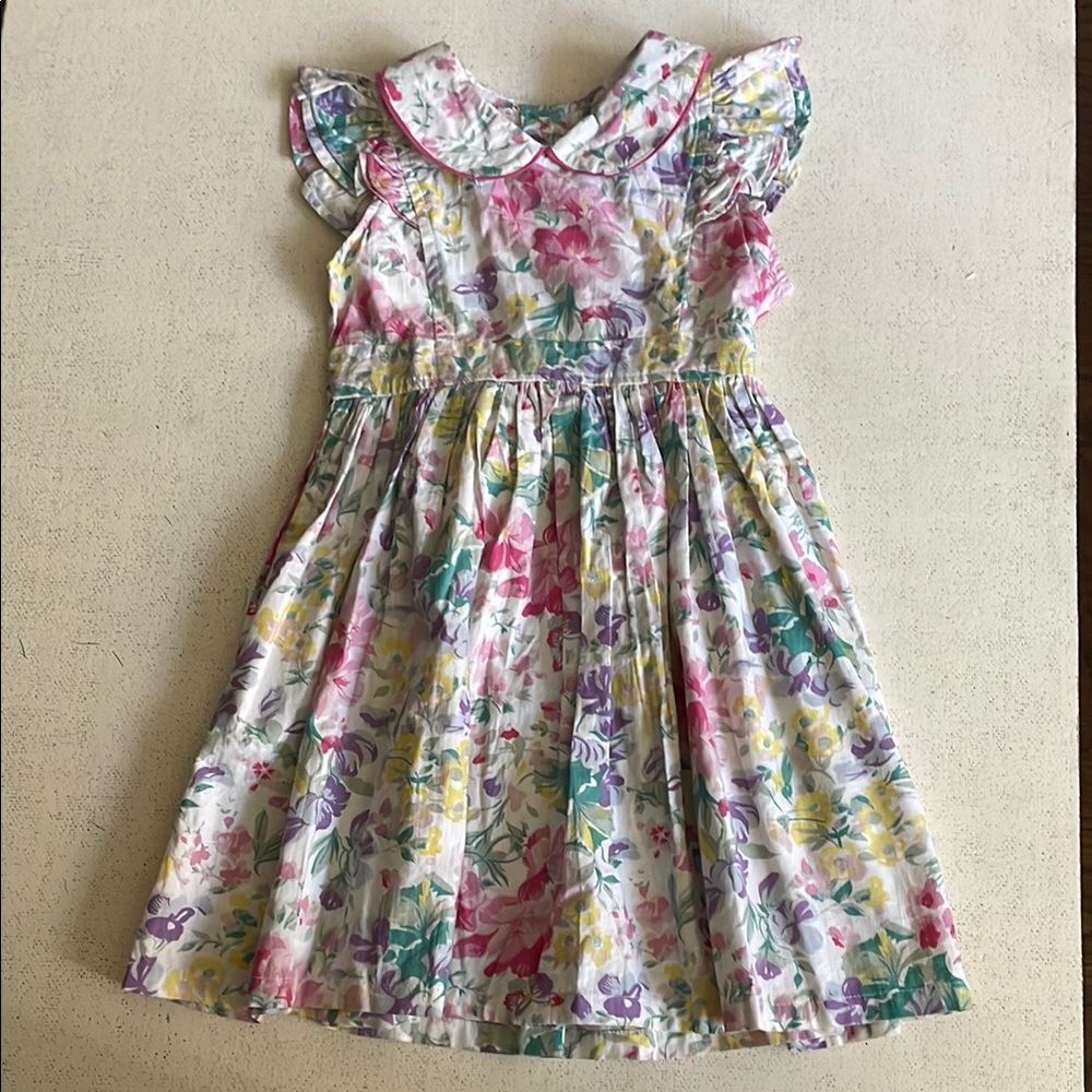 Girl’s cotton multicolored floral dress.